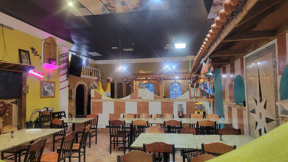 Colorful Mexican dishes on a restaurant table.